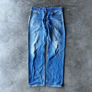 VINTAGE 90S LEVIS 501 JEANS MADE IN USA FADED PATINA LIGHT WASH MENS FITS 34x30